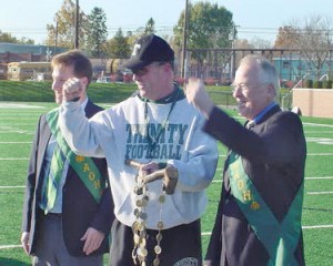 Left: AOH past Pres. Shaun McKiernan, Trinity Coach Bob Beatty, and AOH Sentinal and Trinity alum Tony Lindauer in 2006